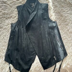Faux suede vest. Worn 1-2 times for a concert